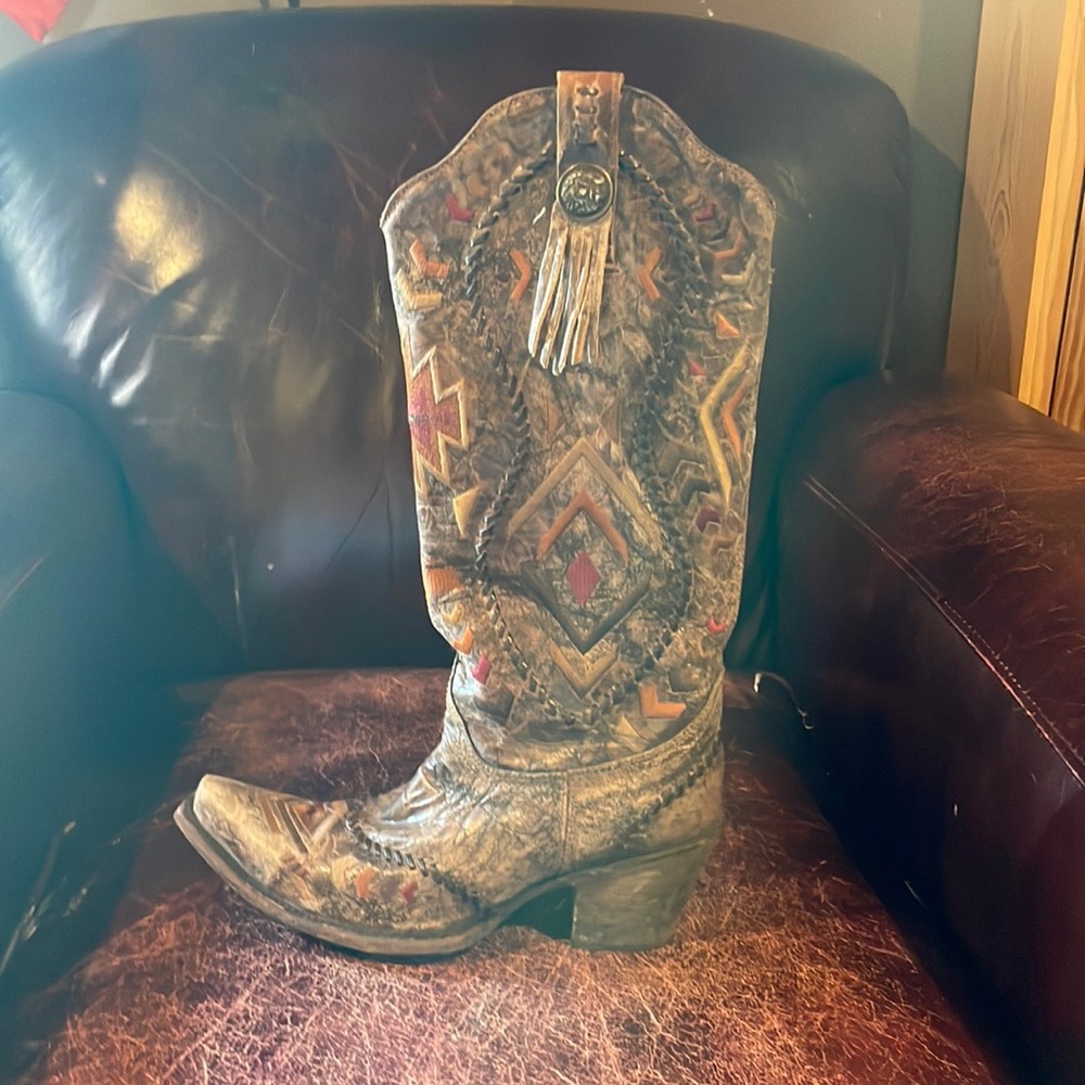 Over the knee, brown Corral western/cowgirl boot.